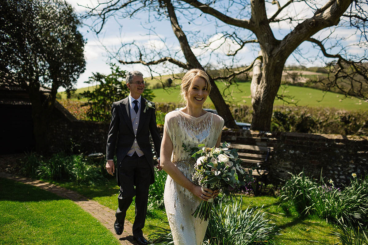 Michelle wore a chic, beaded, Jenny Packham gown for her elegant Sussex barn wedding. Photography by Paul Joseph.