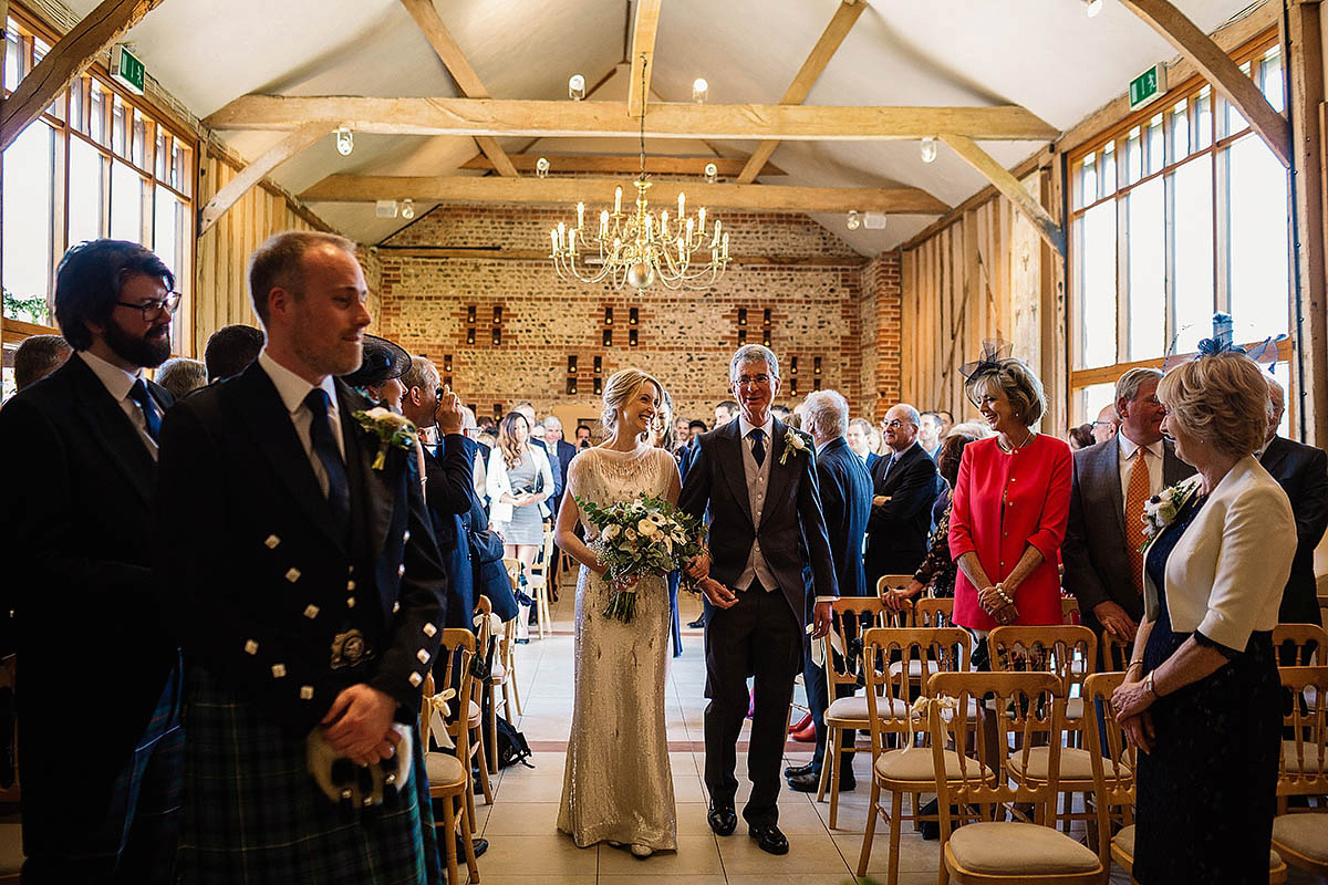 Michelle wore a chic, beaded, Jenny Packham gown for her elegant Sussex barn wedding. Photography by Paul Joseph.