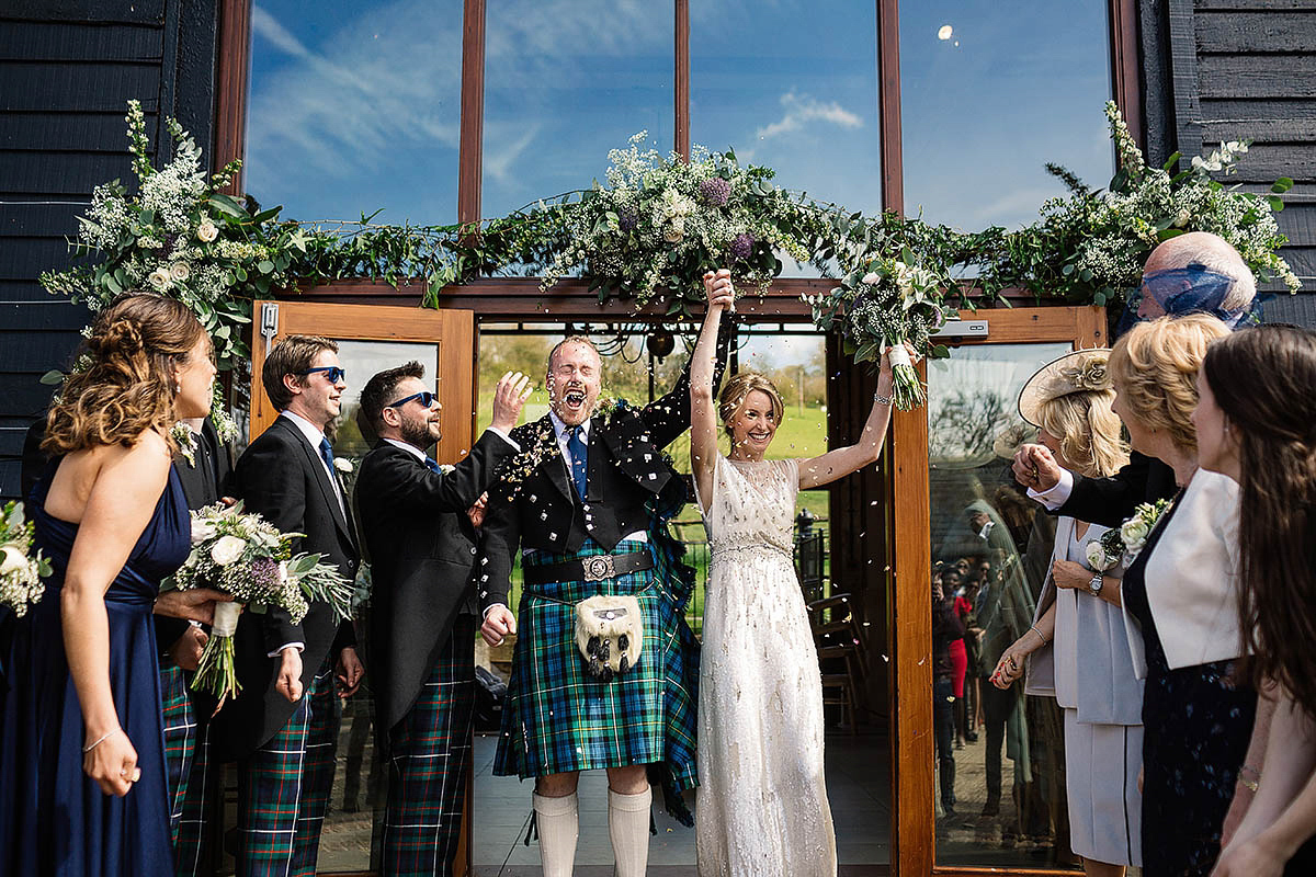 Michelle wore a chic, beaded, Jenny Packham gown for her elegant Sussex barn wedding. Photography by Paul Joseph.