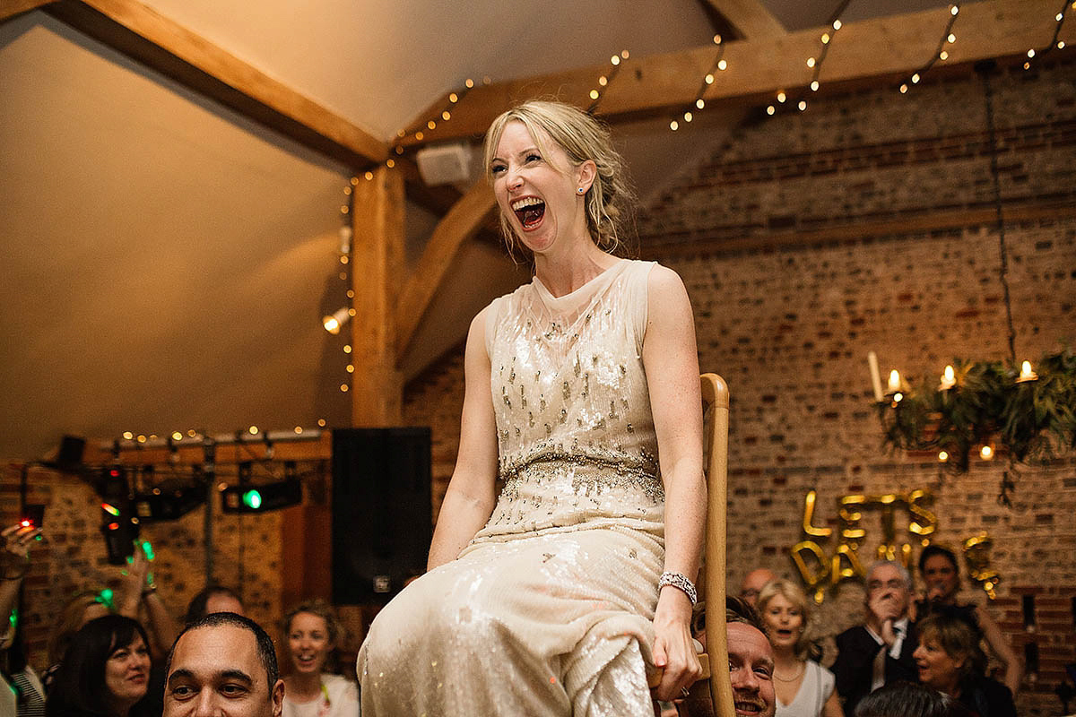 Michelle wore a chic, beaded, Jenny Packham gown for her elegant Sussex barn wedding. Photography by Paul Joseph.