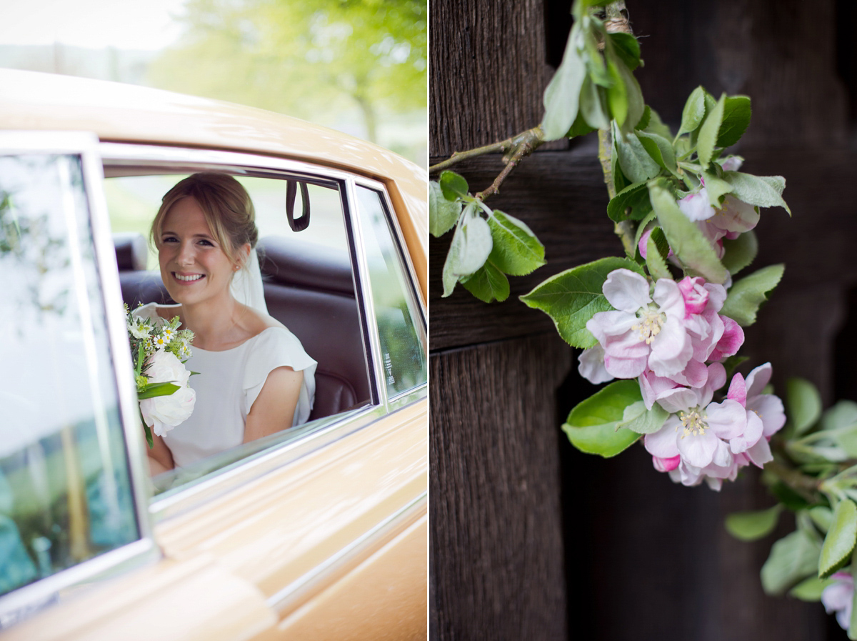 Connie wore a black leather jacket and dress by Belle & Bunty for her English wildfllower meadow inspired wedding. Photography by Emma Sekhonn.
