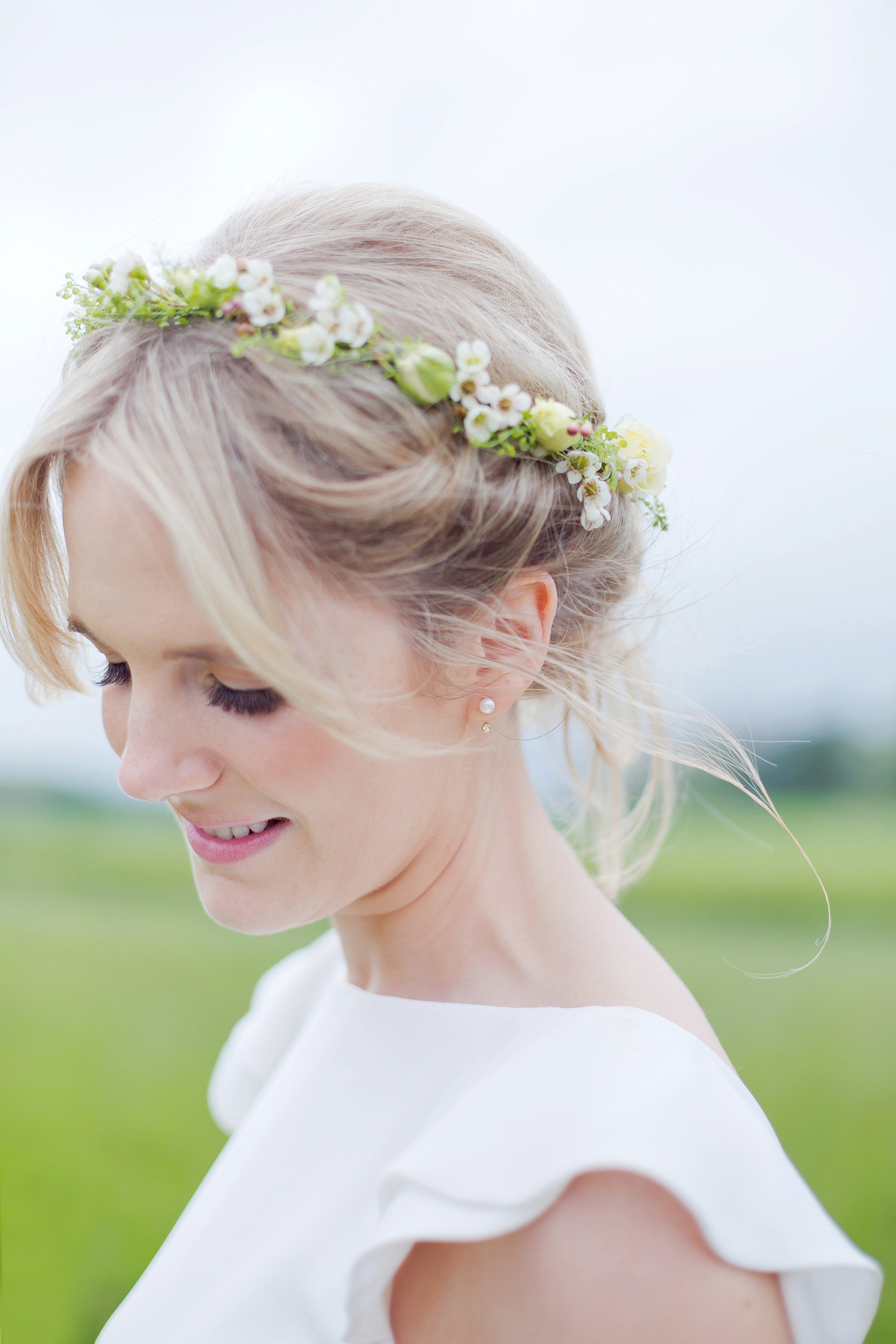 Connie wore a black leather jacket and dress by Belle & Bunty for her English wildfllower meadow inspired wedding. Photography by Emma Sekhonn.