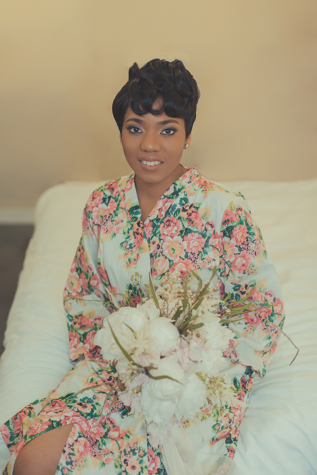 Chioma wore a David's Bridal gown for her Christian and 1920's vintage glamrous inspired wedding. Photography by James Green.