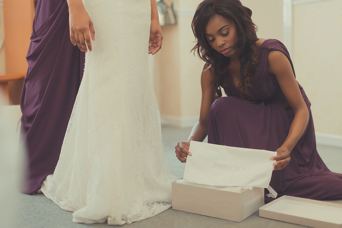 Chioma wore a David's Bridal gown for her Christian and 1920's vintage glamrous inspired wedding. Photography by James Green.