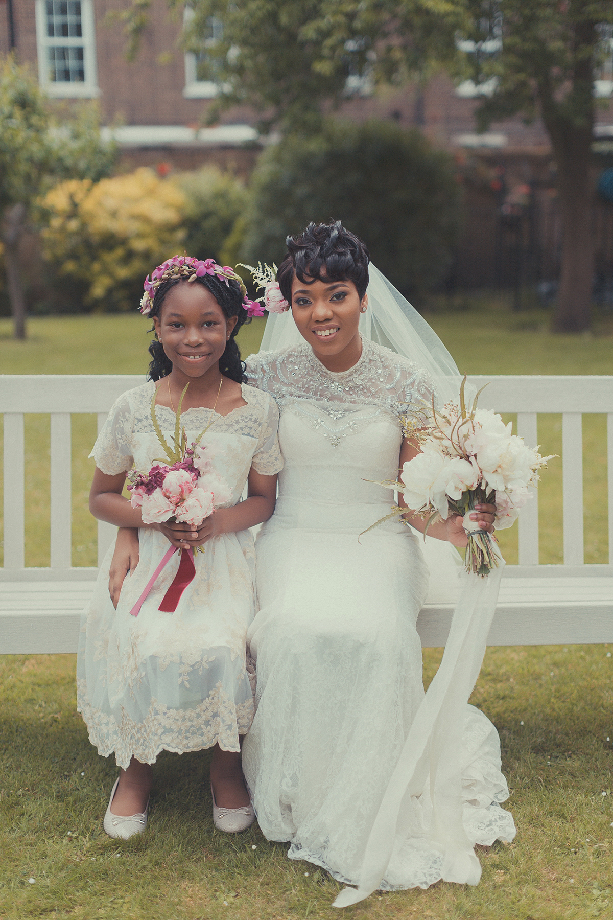 Chioma wore a David's Bridal gown for her Christian and 1920's vintage glamrous inspired wedding. Photography by James Green.