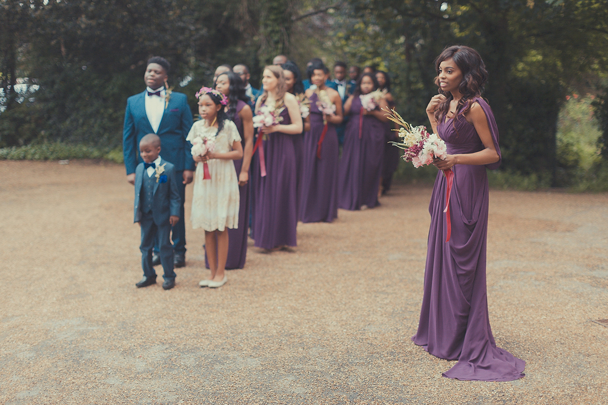 Chioma wore a David's Bridal gown for her Christian and 1920's vintage glamrous inspired wedding. Photography by James Green.