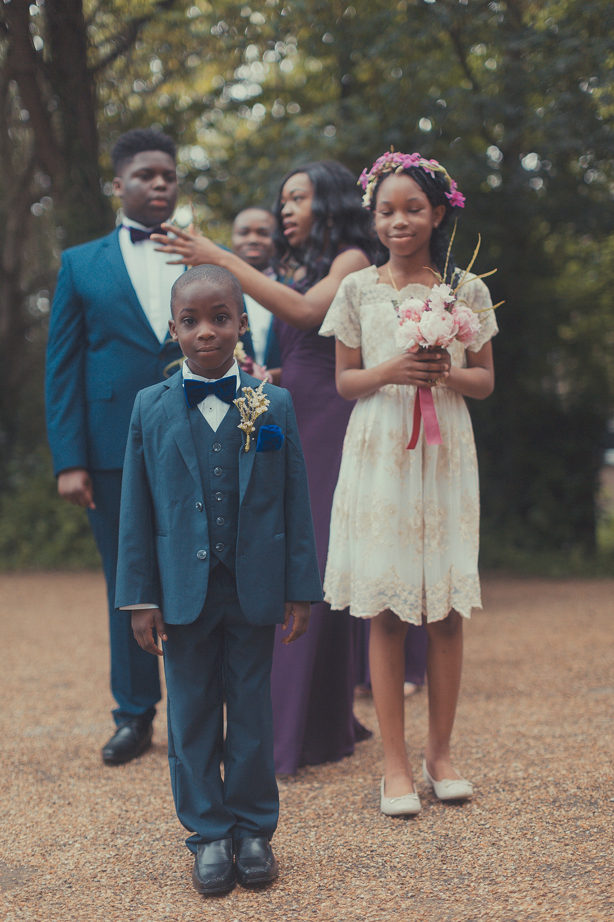 Chioma wore a David's Bridal gown for her Christian and 1920's vintage glamrous inspired wedding. Photography by James Green.