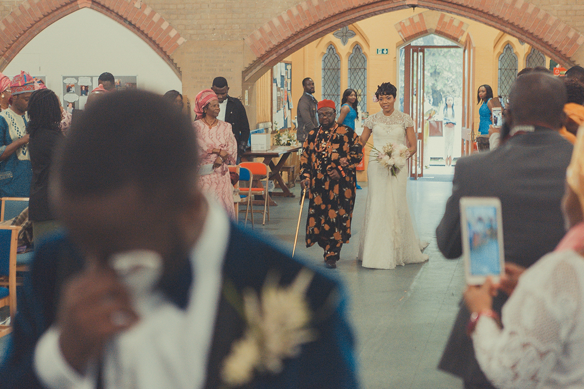 Chioma wore a David's Bridal gown for her Christian and 1920's vintage glamrous inspired wedding. Photography by James Green.