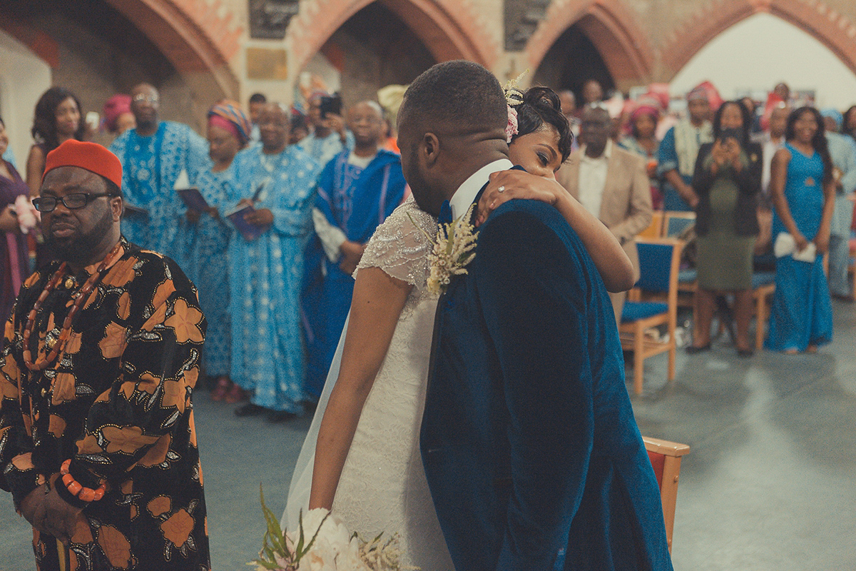 Chioma wore a David's Bridal gown for her Christian and 1920's vintage glamrous inspired wedding. Photography by James Green.