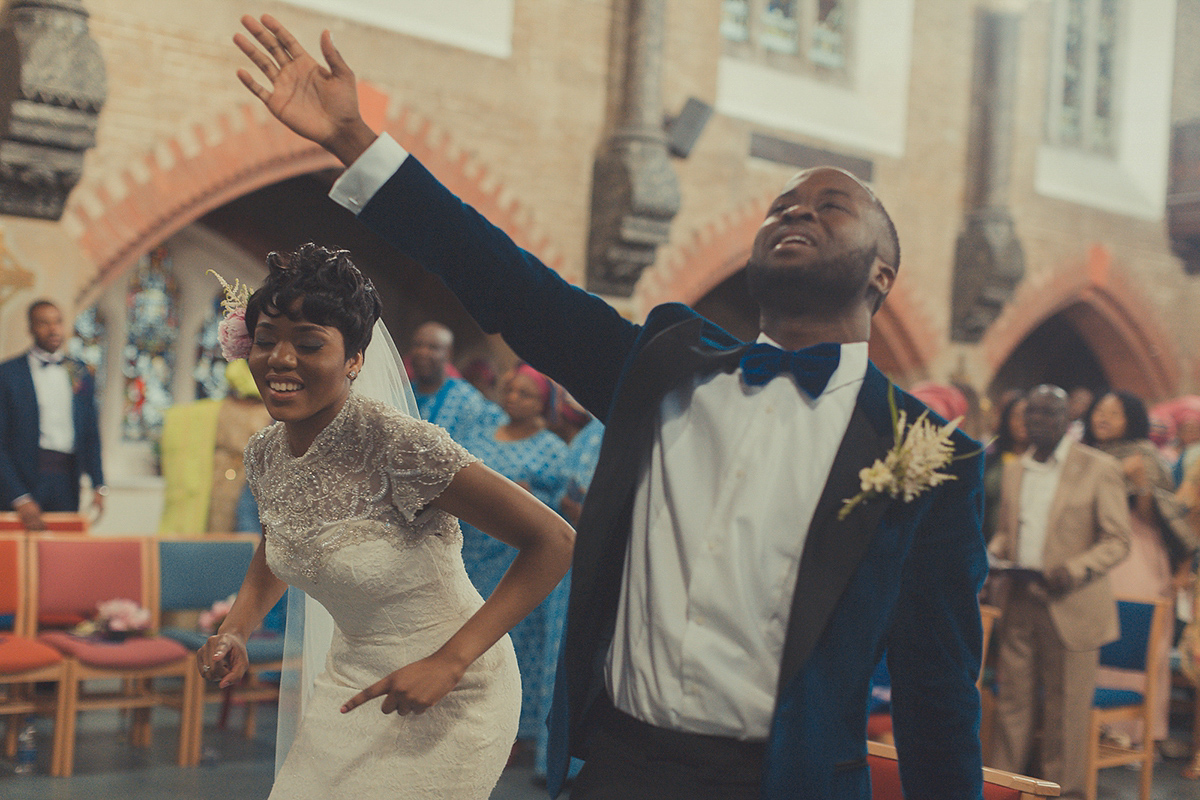 Chioma wore a David's Bridal gown for her Christian and 1920's vintage glamrous inspired wedding. Photography by James Green.