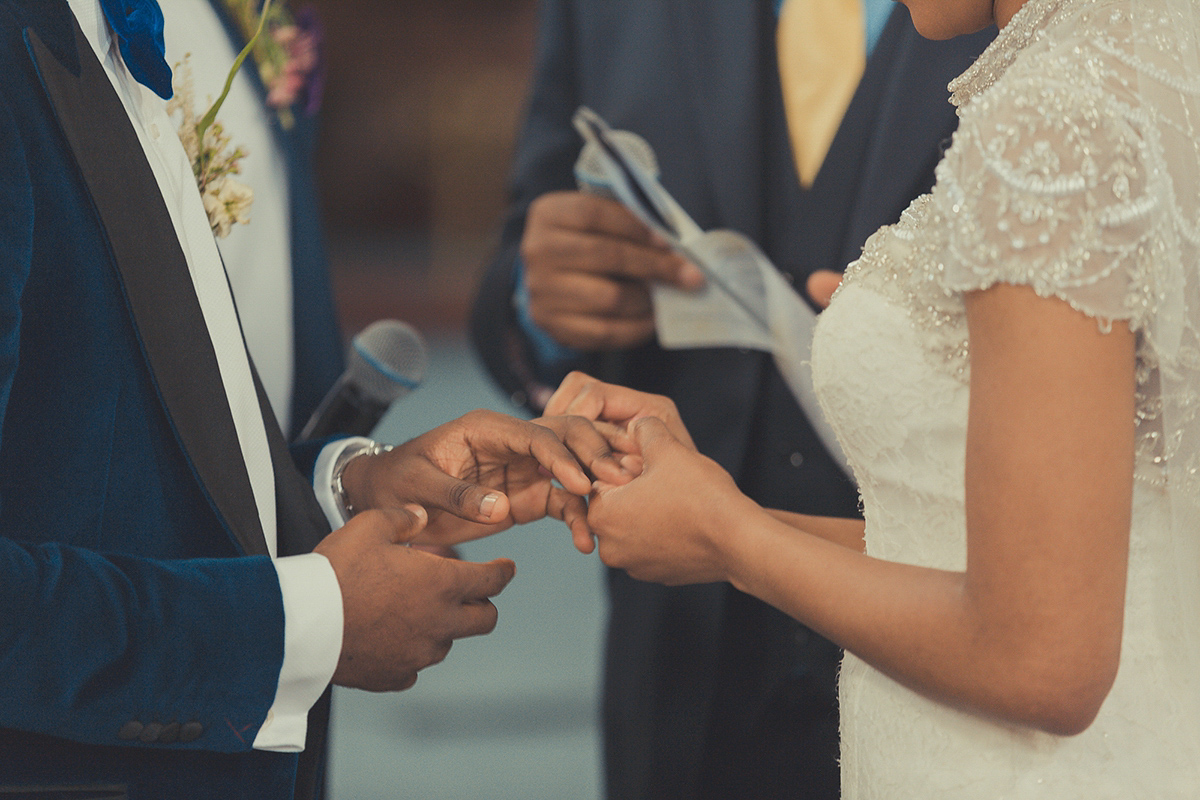 Chioma wore a David's Bridal gown for her Christian and 1920's vintage glamrous inspired wedding. Photography by James Green.