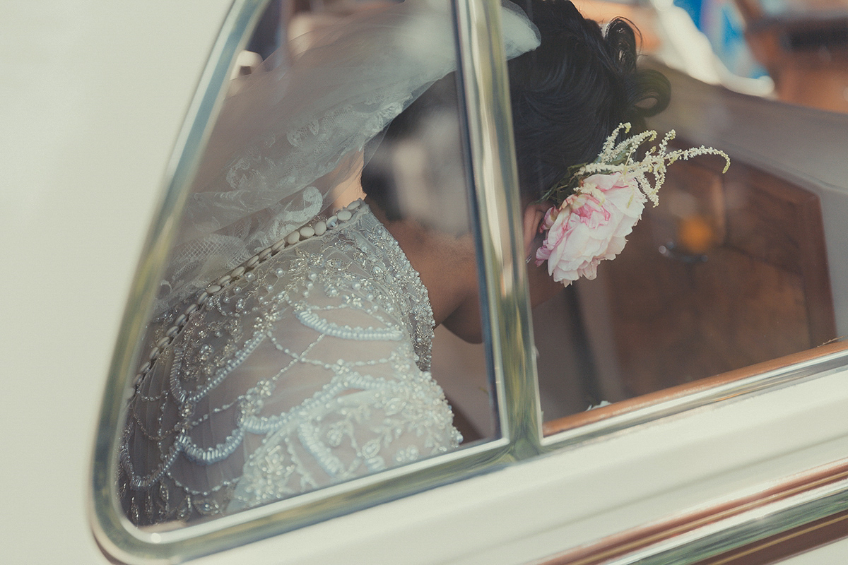 Chioma wore a David's Bridal gown for her Christian and 1920's vintage glamrous inspired wedding. Photography by James Green.