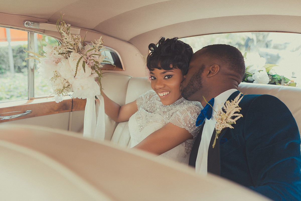 Chioma wore a David's Bridal gown for her Christian and 1920's vintage glamrous inspired wedding. Photography by James Green.