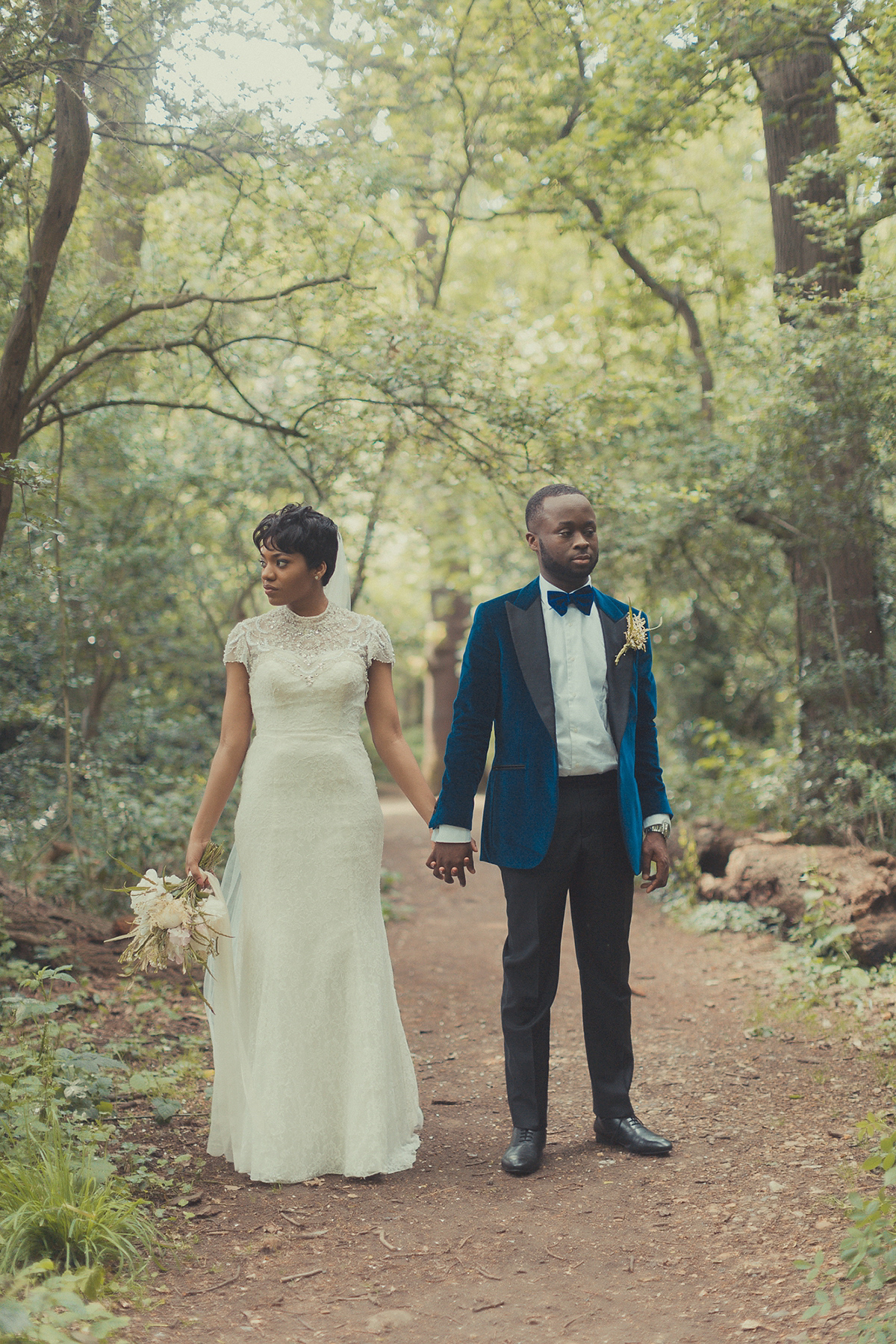 Chioma wore a David's Bridal gown for her Christian and 1920's vintage glamrous inspired wedding. Photography by James Green.