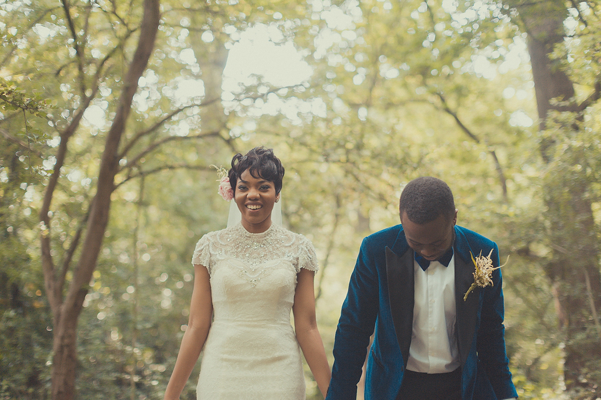 Chioma wore a David's Bridal gown for her Christian and 1920's vintage glamrous inspired wedding. Photography by James Green.