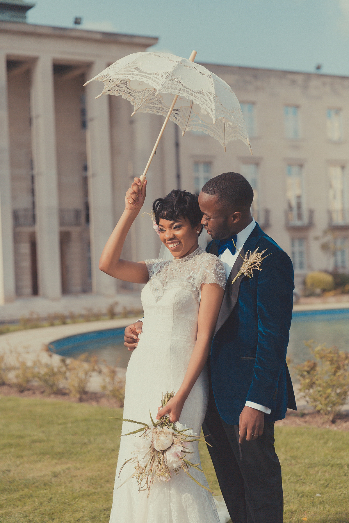 Chioma wore a David's Bridal gown for her Christian and 1920's vintage glamrous inspired wedding. Photography by James Green.