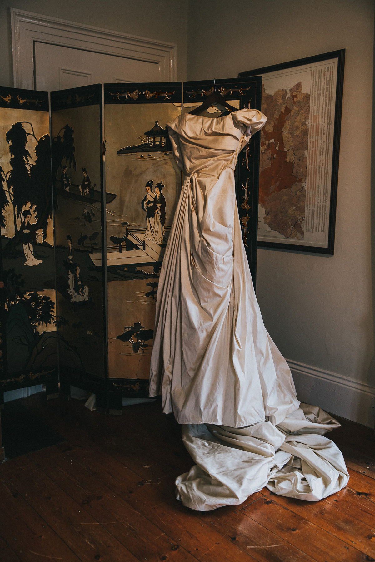 Bride Natasha wore a gown inspired by the dress worn by Dita von Teese for her wedding to Marilyn Manson. Natasha and Ian's wedding was full of Autumnal, gothic romance. Photography by Matt Horan.