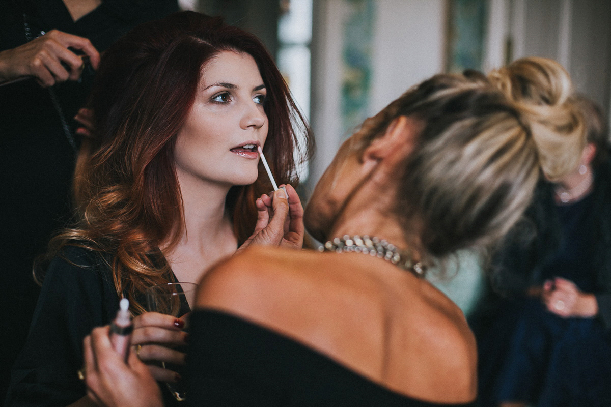 Bride Natasha wore a gown inspired by the dress worn by Dita von Teese for her wedding to Marilyn Manson. Natasha and Ian's wedding was full of Autumnal, gothic romance. Photography by Matt Horan.