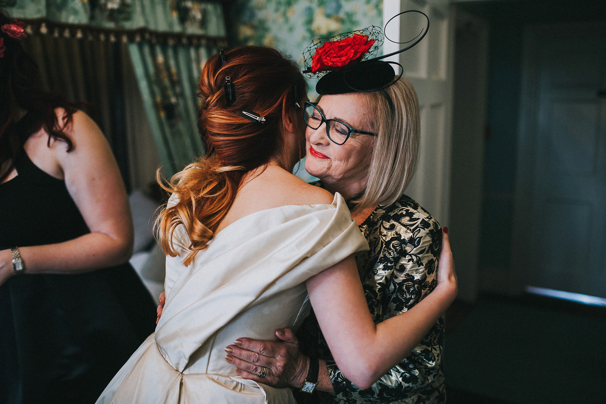 Bride Natasha wore a gown inspired by the dress worn by Dita von Teese for her wedding to Marilyn Manson. Natasha and Ian's wedding was full of Autumnal, gothic romance. Photography by Matt Horan.