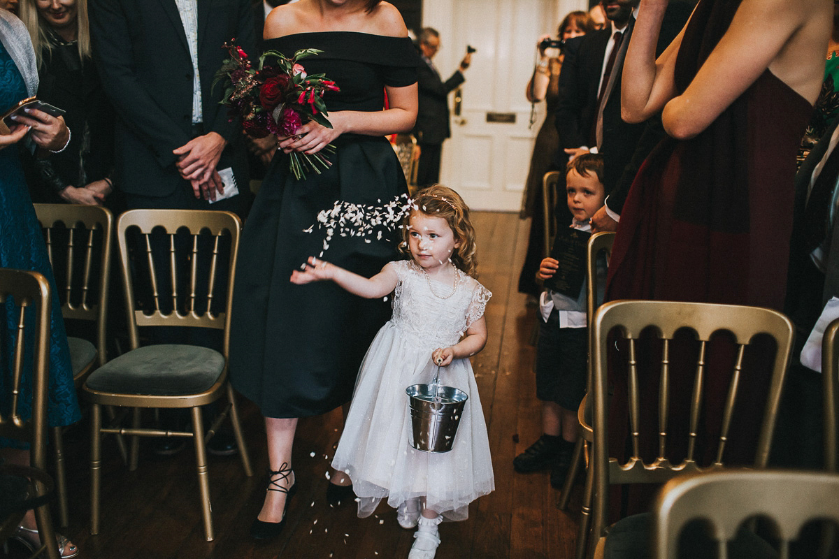 Bride Natasha wore a gown inspired by the dress worn by Dita von Teese for her wedding to Marilyn Manson. Natasha and Ian's wedding was full of Autumnal, gothic romance. Photography by Matt Horan.