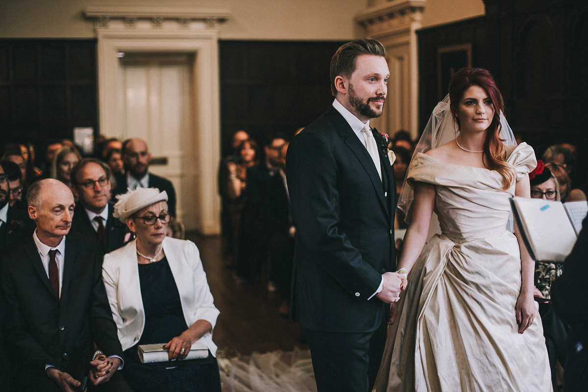 Bride Natasha wore a gown inspired by the dress worn by Dita von Teese for her wedding to Marilyn Manson. Natasha and Ian's wedding was full of Autumnal, gothic romance. Photography by Matt Horan.