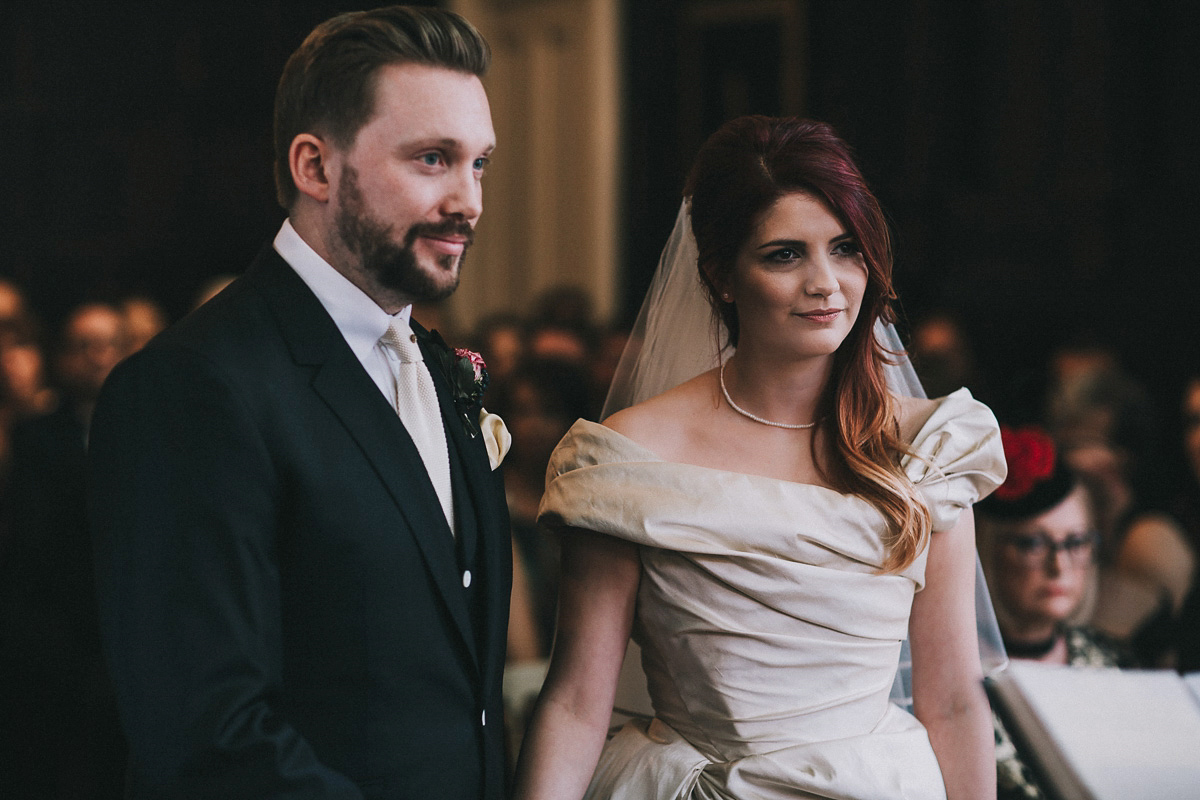Bride Natasha wore a gown inspired by the dress worn by Dita von Teese for her wedding to Marilyn Manson. Natasha and Ian's wedding was full of Autumnal, gothic romance. Photography by Matt Horan.