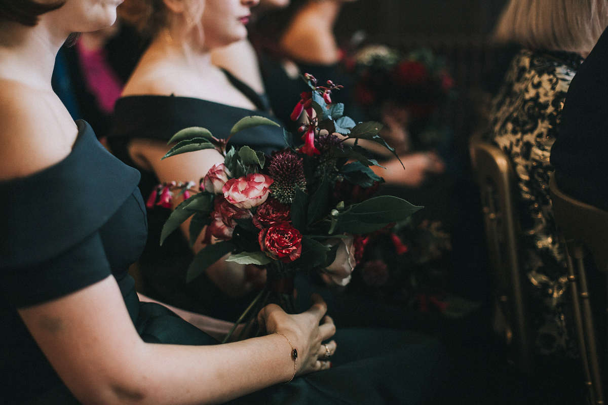 Bride Natasha wore a gown inspired by the dress worn by Dita von Teese for her wedding to Marilyn Manson. Natasha and Ian's wedding was full of Autumnal, gothic romance. Photography by Matt Horan.