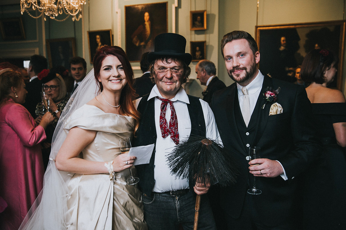 Bride Natasha wore a gown inspired by the dress worn by Dita von Teese for her wedding to Marilyn Manson. Natasha and Ian's wedding was full of Autumnal, gothic romance. Photography by Matt Horan.