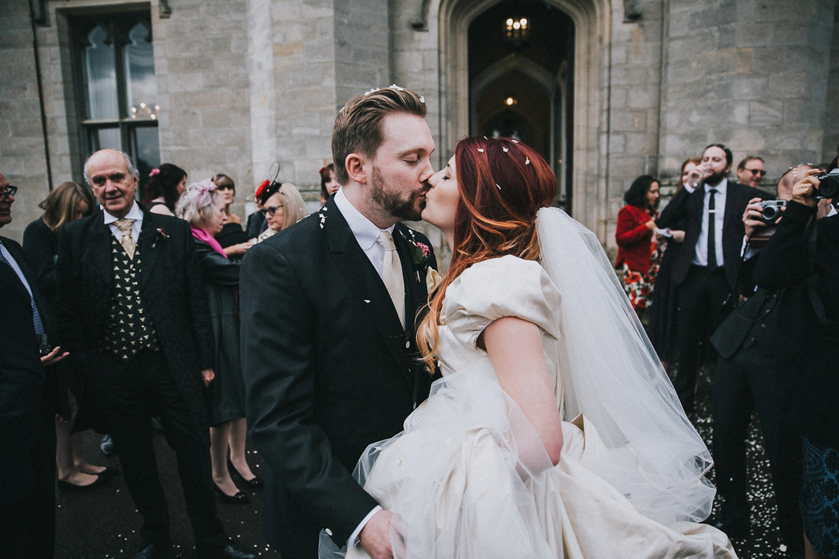 Bride Natasha wore a gown inspired by the dress worn by Dita von Teese for her wedding to Marilyn Manson. Natasha and Ian's wedding was full of Autumnal, gothic romance. Photography by Matt Horan.