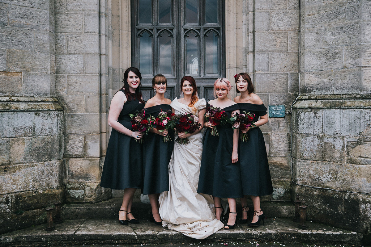 Bride Natasha wore a gown inspired by the dress worn by Dita von Teese for her wedding to Marilyn Manson. Natasha and Ian's wedding was full of Autumnal, gothic romance. Photography by Matt Horan.