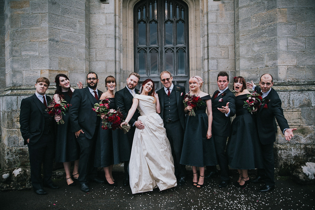 Bride Natasha wore a gown inspired by the dress worn by Dita von Teese for her wedding to Marilyn Manson. Natasha and Ian's wedding was full of Autumnal, gothic romance. Photography by Matt Horan.