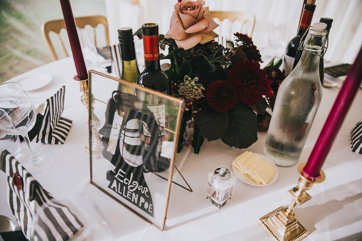 Bride Natasha wore a gown inspired by the dress worn by Dita von Teese for her wedding to Marilyn Manson. Natasha and Ian's wedding was full of Autumnal, gothic romance. Photography by Matt Horan.