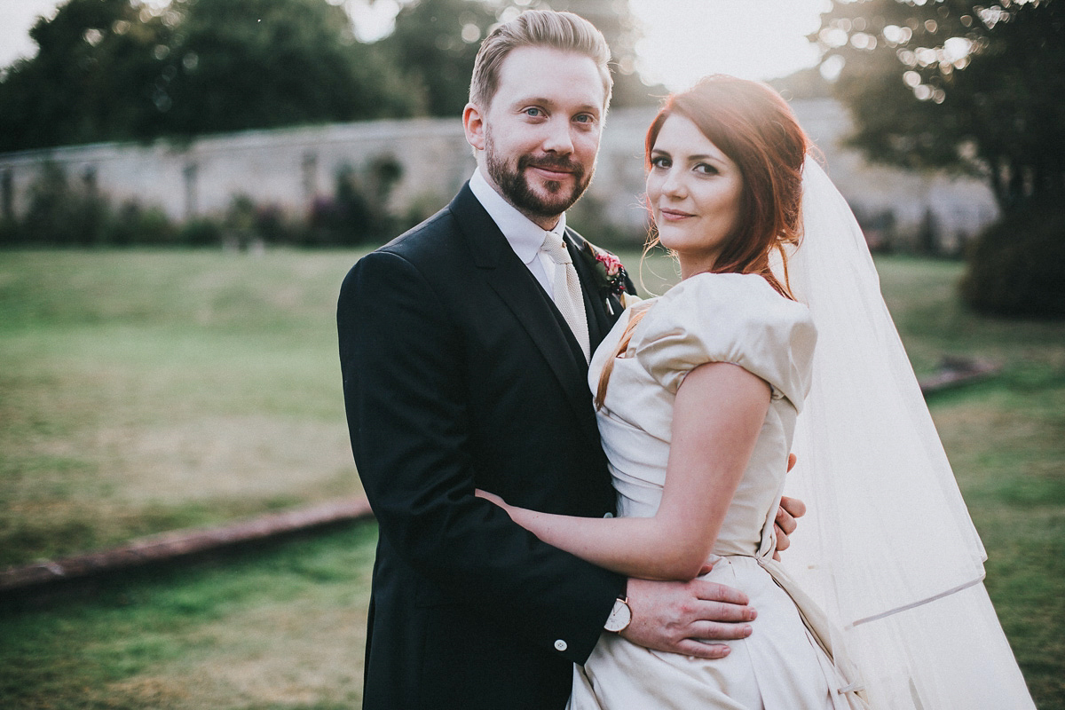 Bride Natasha wore a gown inspired by the dress worn by Dita von Teese for her wedding to Marilyn Manson. Natasha and Ian's wedding was full of Autumnal, gothic romance. Photography by Matt Horan.