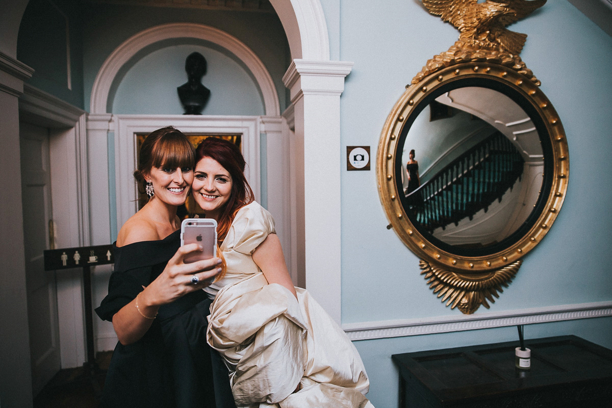 Bride Natasha wore a gown inspired by the dress worn by Dita von Teese for her wedding to Marilyn Manson. Natasha and Ian's wedding was full of Autumnal, gothic romance. Photography by Matt Horan.