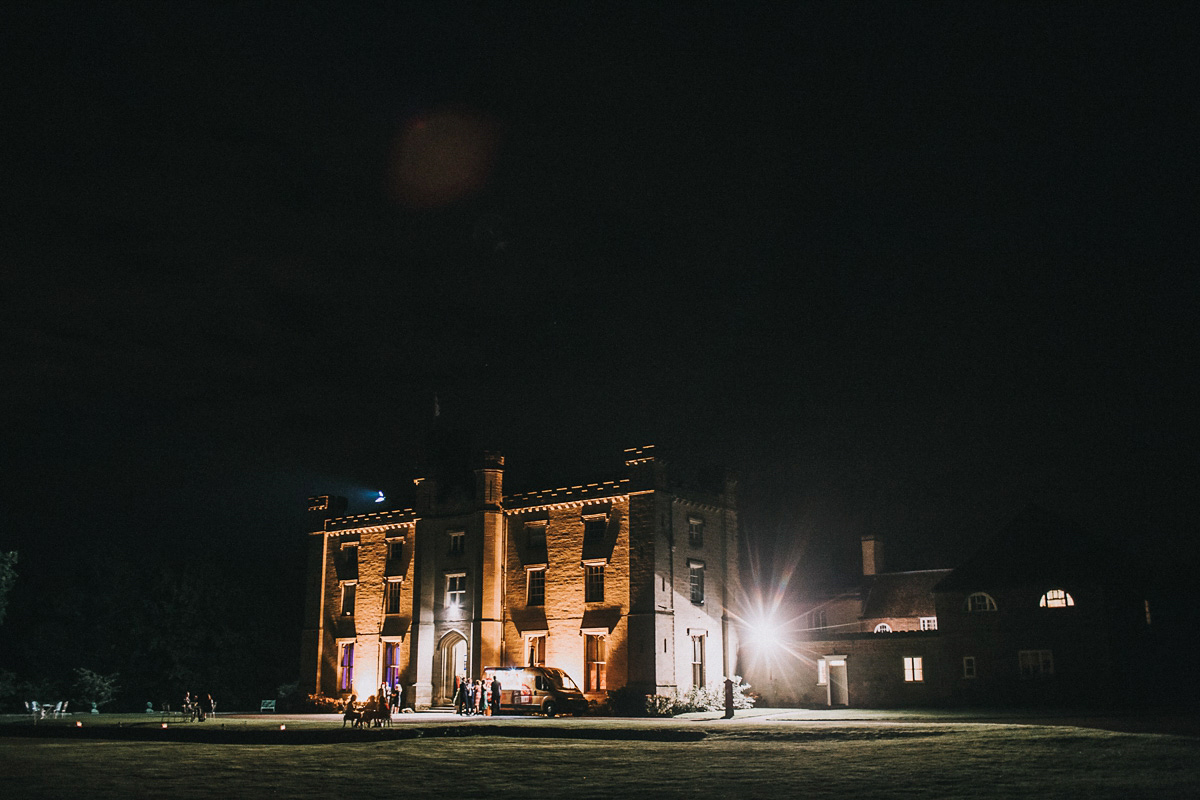 Bride Natasha wore a gown inspired by the dress worn by Dita von Teese for her wedding to Marilyn Manson. Natasha and Ian's wedding was full of Autumnal, gothic romance. Photography by Matt Horan.