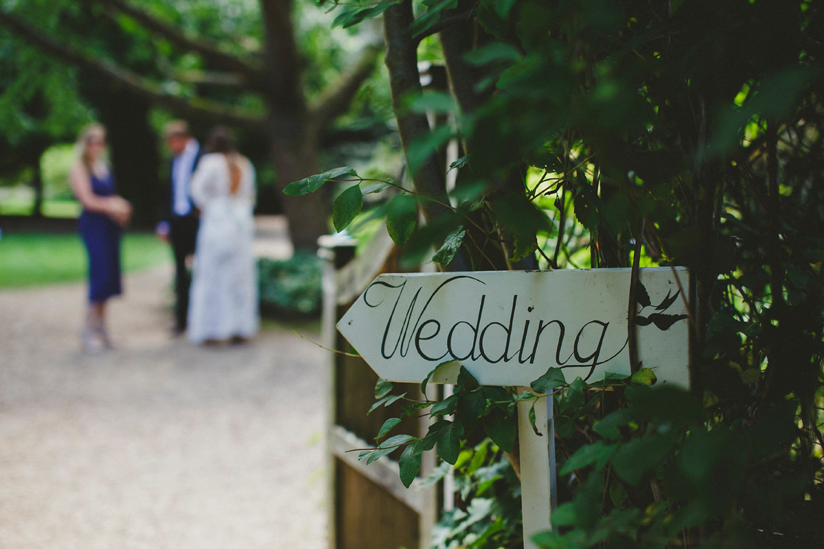 Katie wore a Catherne Deane gown from Leonie Claire bridal boutique in Hove, for her lovely summer garden wedding. Photography by Manon Pauffin.