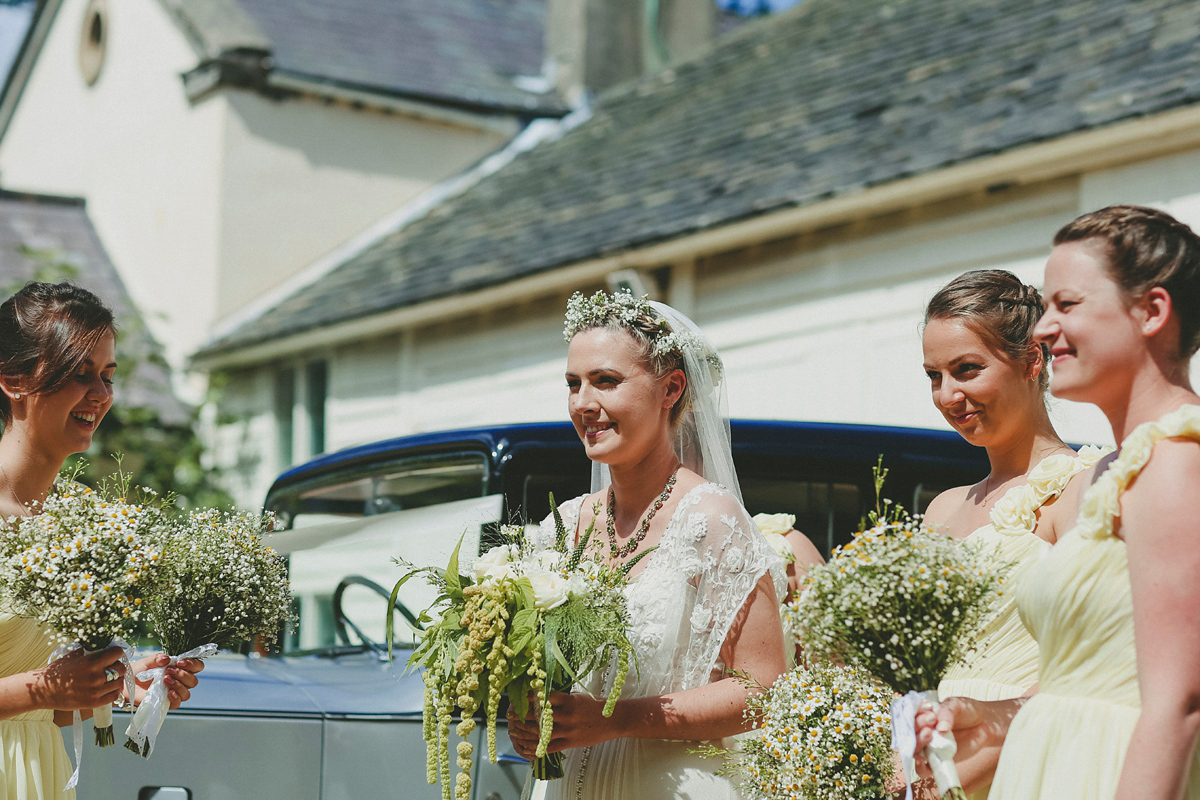 Katie wore a Catherne Deane gown from Leonie Claire bridal boutique in Hove, for her lovely summer garden wedding. Photography by Manon Pauffin.