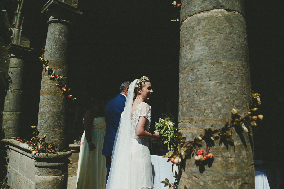 Katie wore a Catherne Deane gown from Leonie Claire bridal boutique in Hove, for her lovely summer garden wedding. Photography by Manon Pauffin.