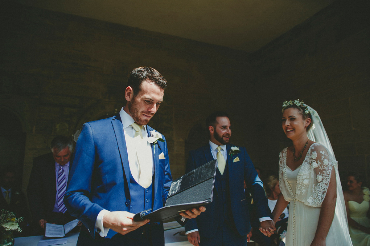 Katie wore a Catherne Deane gown from Leonie Claire bridal boutique in Hove, for her lovely summer garden wedding. Photography by Manon Pauffin.