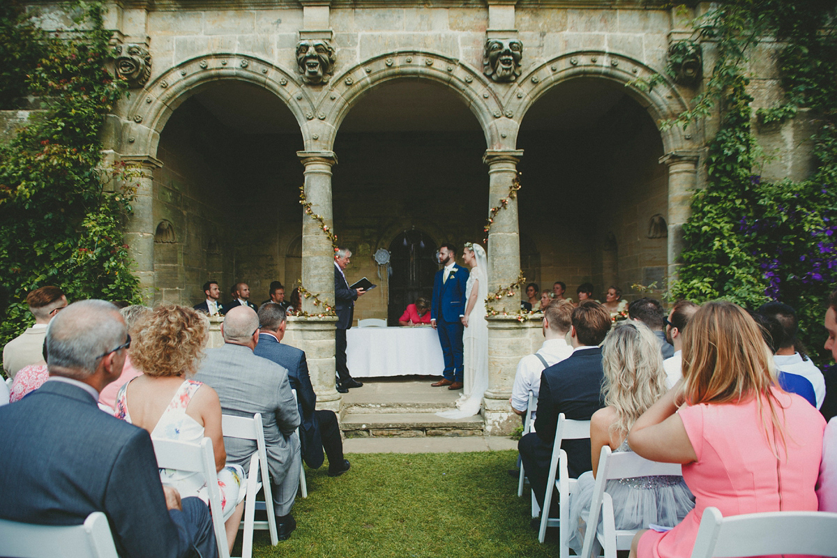 Katie wore a Catherne Deane gown from Leonie Claire bridal boutique in Hove, for her lovely summer garden wedding. Photography by Manon Pauffin.