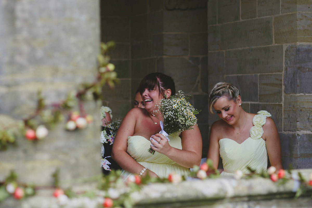 Katie wore a Catherne Deane gown from Leonie Claire bridal boutique in Hove, for her lovely summer garden wedding. Photography by Manon Pauffin.