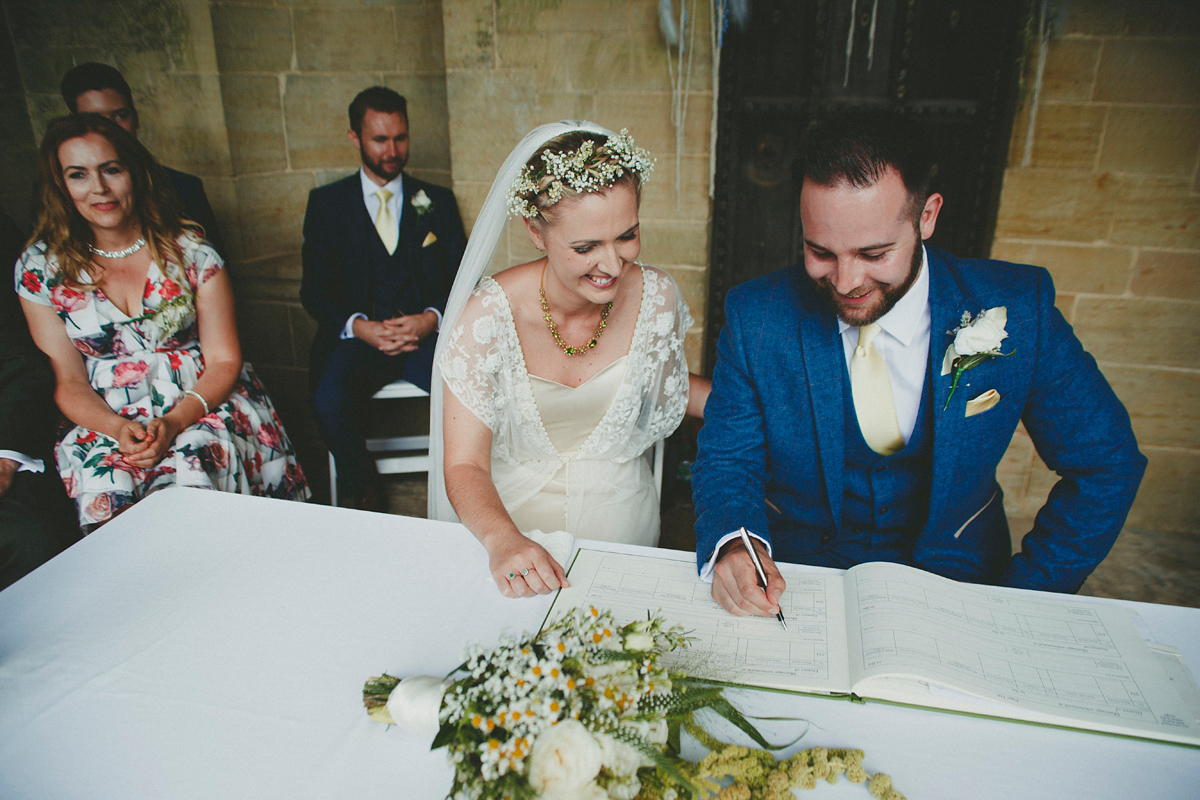 Katie wore a Catherne Deane gown from Leonie Claire bridal boutique in Hove, for her lovely summer garden wedding. Photography by Manon Pauffin.