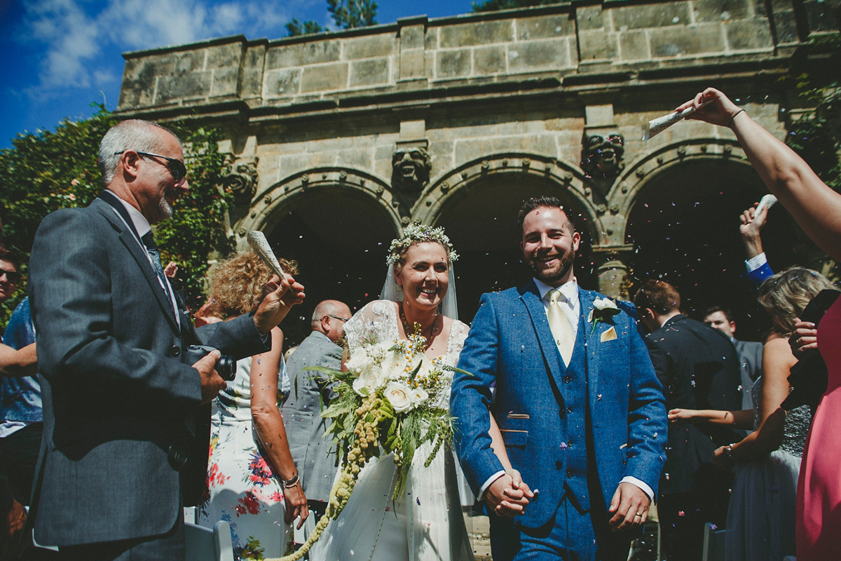 Katie wore a Catherne Deane gown from Leonie Claire bridal boutique in Hove, for her lovely summer garden wedding. Photography by Manon Pauffin.