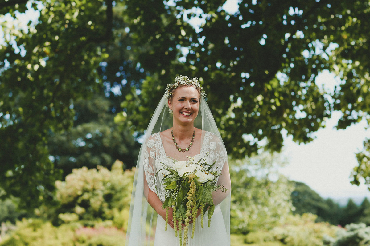 Katie wore a Catherne Deane gown from Leonie Claire bridal boutique in Hove, for her lovely summer garden wedding. Photography by Manon Pauffin.