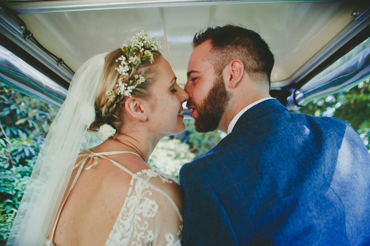 Katie wore a Catherne Deane gown from Leonie Claire bridal boutique in Hove, for her lovely summer garden wedding. Photography by Manon Pauffin.