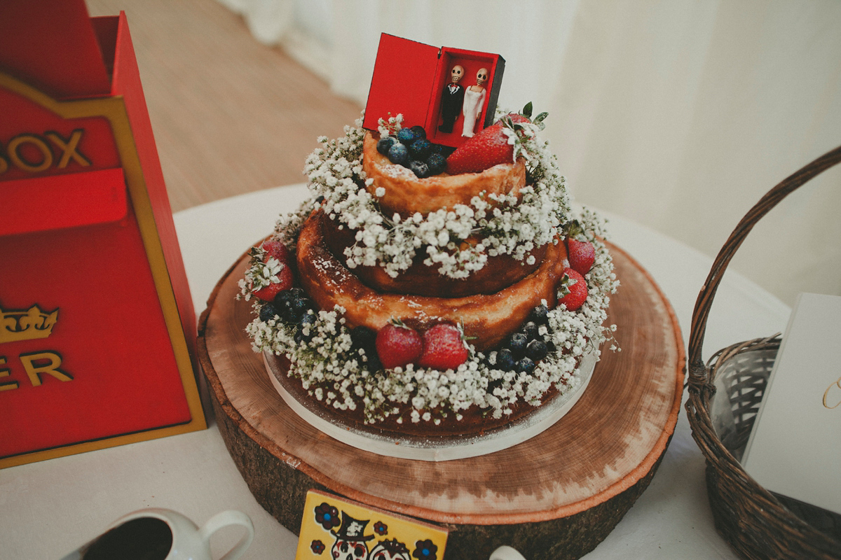 Katie wore a Catherne Deane gown from Leonie Claire bridal boutique in Hove, for her lovely summer garden wedding. Photography by Manon Pauffin.