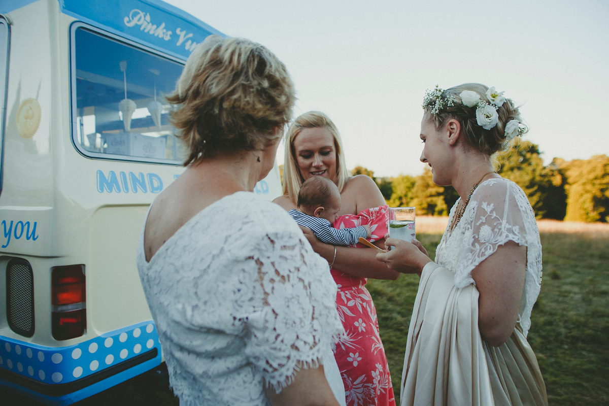 Katie wore a Catherne Deane gown from Leonie Claire bridal boutique in Hove, for her lovely summer garden wedding. Photography by Manon Pauffin.