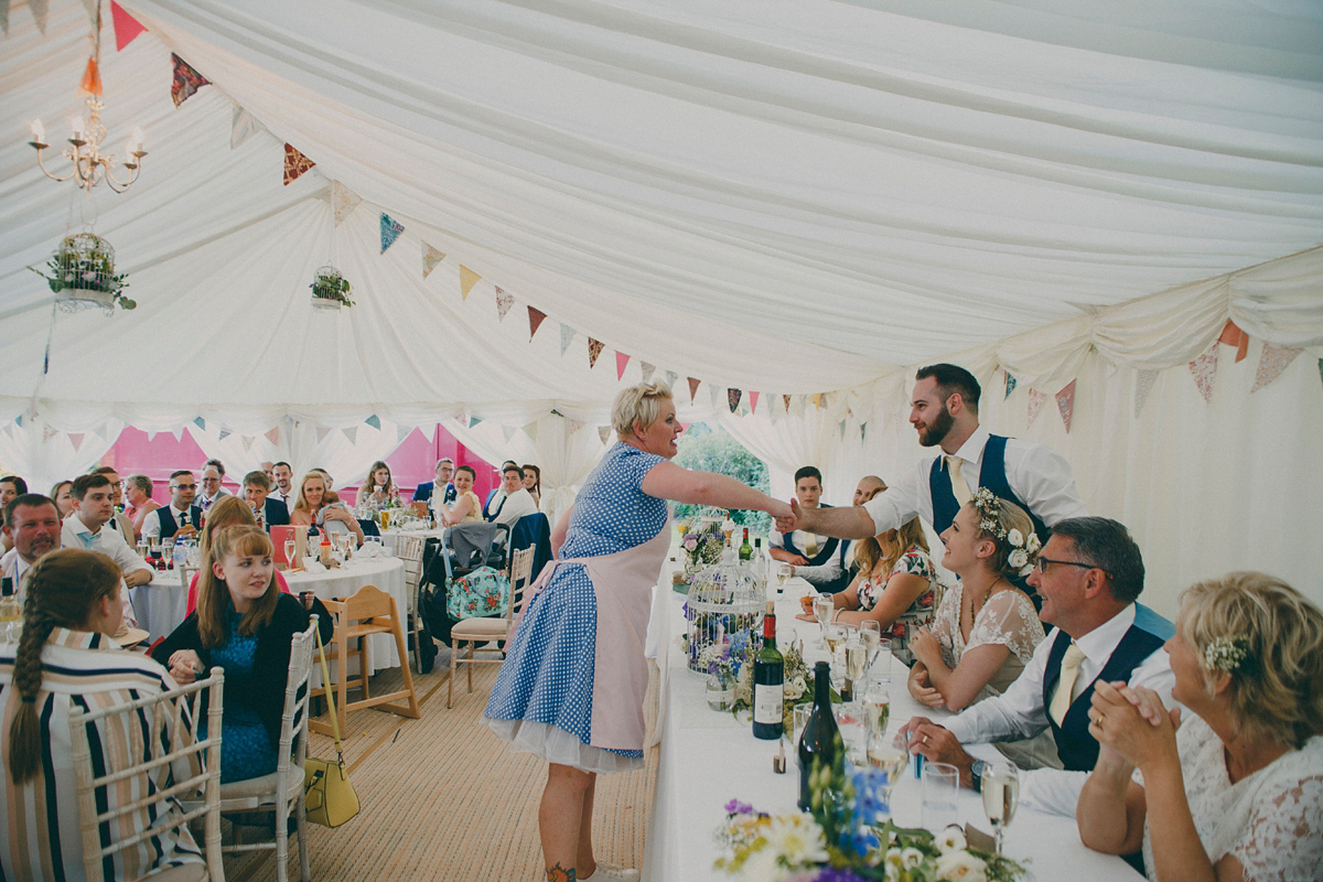 Katie wore a Catherne Deane gown from Leonie Claire bridal boutique in Hove, for her lovely summer garden wedding. Photography by Manon Pauffin.