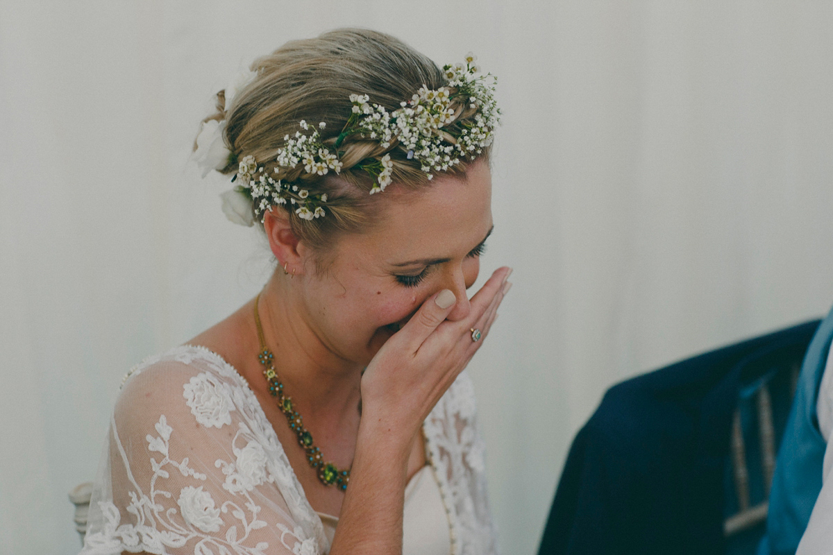 Katie wore a Catherne Deane gown from Leonie Claire bridal boutique in Hove, for her lovely summer garden wedding. Photography by Manon Pauffin.