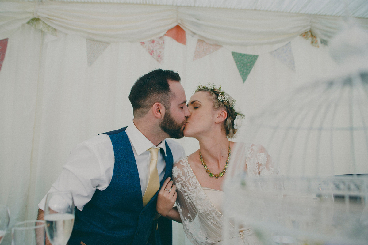 Katie wore a Catherne Deane gown from Leonie Claire bridal boutique in Hove, for her lovely summer garden wedding. Photography by Manon Pauffin.